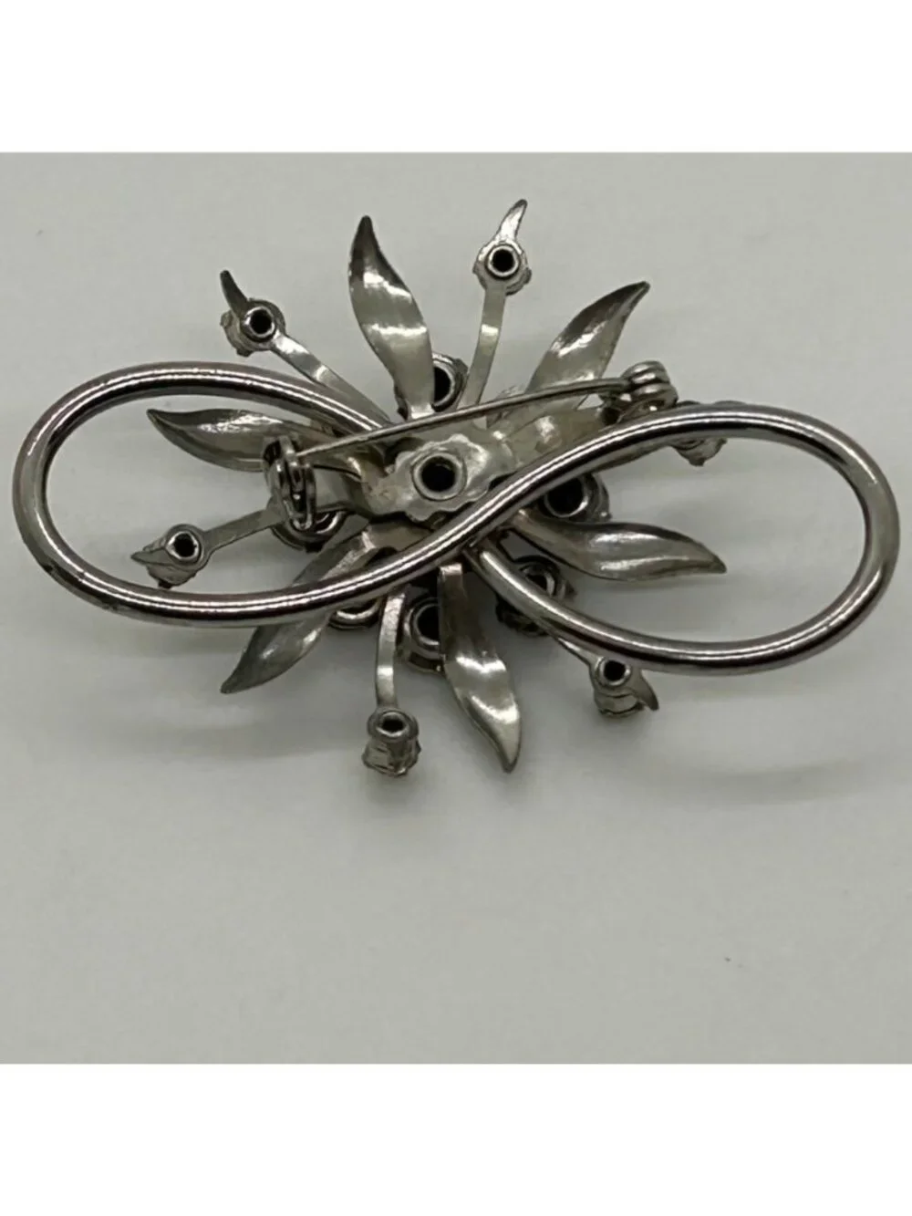 Vintage Clear Rhinestone Brooch Infinity Starburst Floral Pin Silver-tone MCM